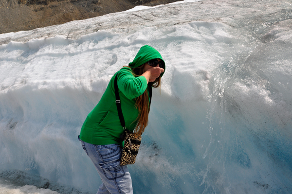 Karen Duquette drinking the water